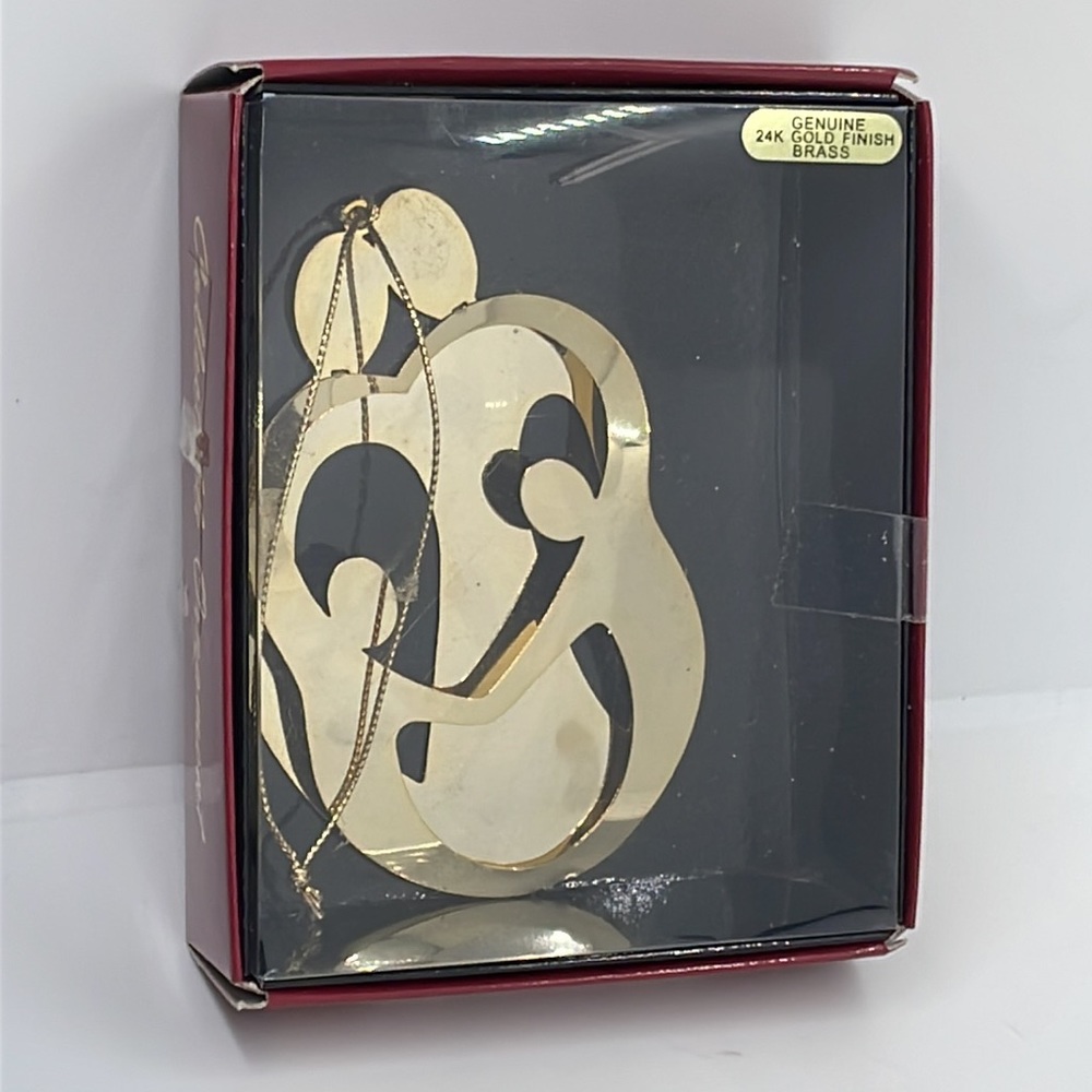 Brass Family of Four Ornament by Ringmasters